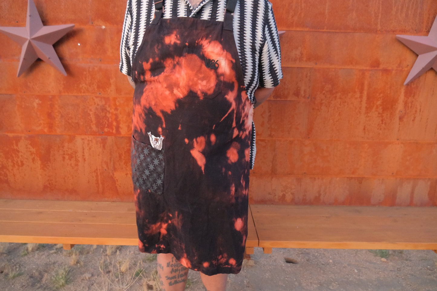 "LIVE FROM THE GUTTER" BLEACHED BLACK APRON WITH ROCKING RACCOON PATCH